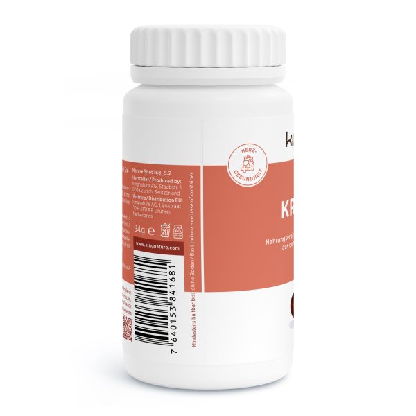 Eine weiße Plastikflasche mit geripptem Verschluss und orangefarbenem Etikett mit deutschem Text, einem Barcode und einem kleinen Herzsymbol. Das Etikett umschließt die Flasche teilweise und zeigt Informationen zu Nahrungsergänzungsmitteln.