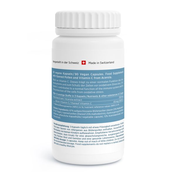 Eine weiße Flasche mit der Aufschrift „Made in Switzerland“ und einem blauen Etikett in Deutsch und Englisch, das vegane Kapseln mit geöffnetem Pollen und Acerola-Vitamin C beschreibt. Dosierungs- und Nährwertangaben sind abgebildet.