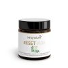Ein braunes Glas mit schwarzem Deckel und der Aufschrift „Reset Vida“. Das Etikett zeigt grüne Blätter und weist darauf hin, dass es sich um ein Nahrungsergänzungsmittel mit japanischen Rosinen, L-Carnosin und Vitamin B12 handelt.
