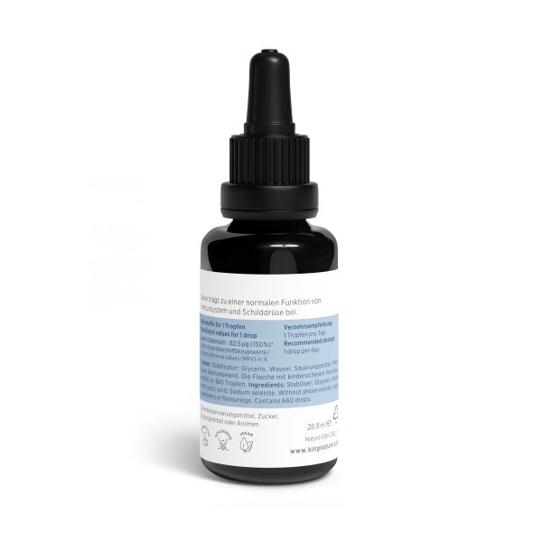 Eine schwarze Tropfflasche mit der Aufschrift „Selen Vida“ und blauem Design zeigt deutschen Text, Dosierungsanweisungen, Inhaltsstoffe und Symbole. Die Flasche steht aufrecht vor einem weißen Hintergrund.